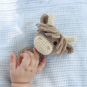 PDF crochet pattern for small Highland cow rattle toy.