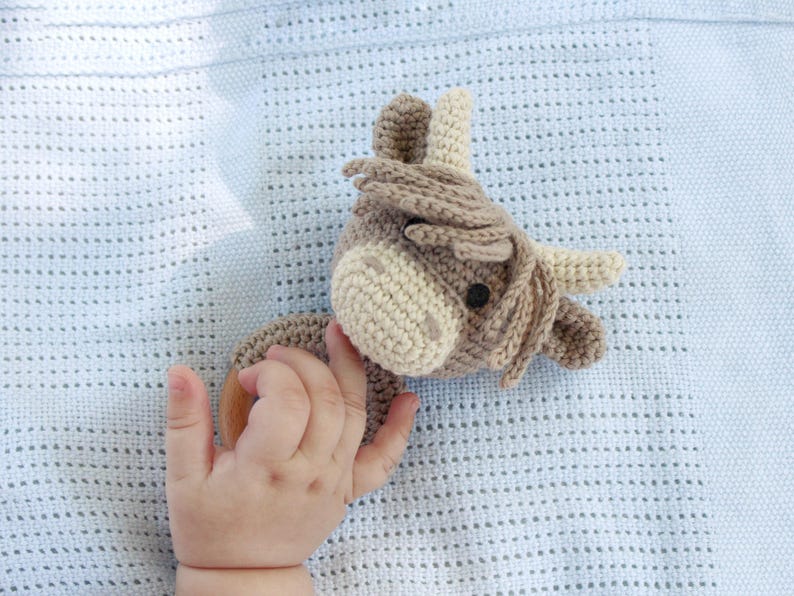 PDF crochet pattern for small Highland cow rattle toy.