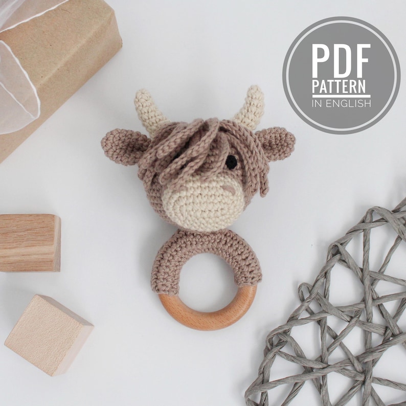 Crochet pattern for Highland cow baby rattle. 4.3 inches (11 cm), brown and cream
