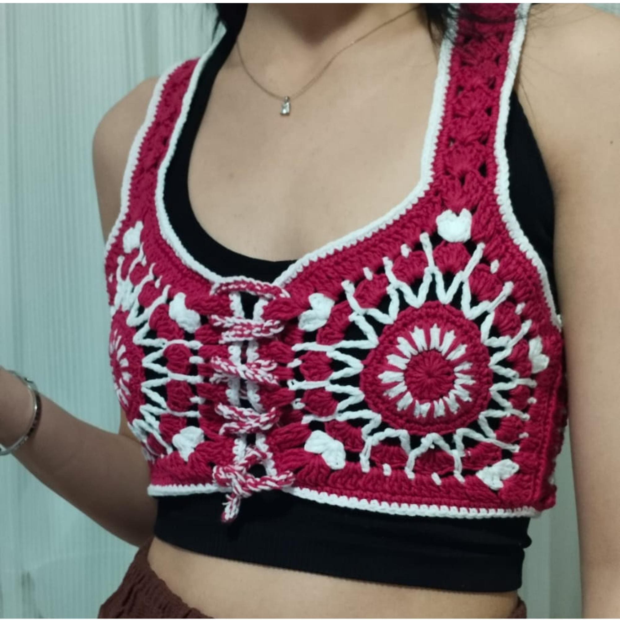 39 Crochet Women’s Tops: Tanks, Vests, Tees, and Blouses 32 Granny Square Crochet Vest