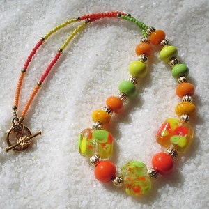 SALSA NECKLACE, Pretty Square Tab Focal Orange Green Mango And Yellow Pineapple Textured BEADS Gold Plated Necklace
