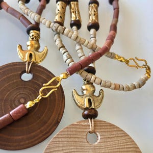 Museum replica of Precolumbian gold jewelry. Princess length necklace
