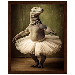 May include: A Komodo dragon wearing a white tutu and standing on a wooden floor. The dragon is posed as if it is a ballerina.
