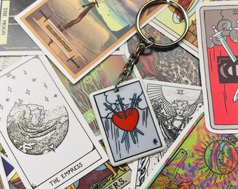 Colorful 3 of Swords Tarot keychain and two random pick Tarot Stickers