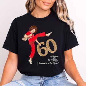 May include: Black t-shirt with a gold glitter 60 and a cartoon woman kicking. The text reads "I like to kick, stretch and kick!"