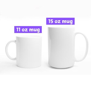 May include: Two white ceramic mugs, one labeled "11 oz mug" and the other "15 oz mug".