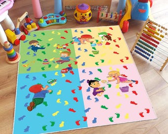 May include: A brightly coloured play mat with a cartoon design featuring babies, toys, and footprints. The mat is divided into four sections, each with a different pastel colour. Toys like cars, blocks, and musical instruments are scattered around.