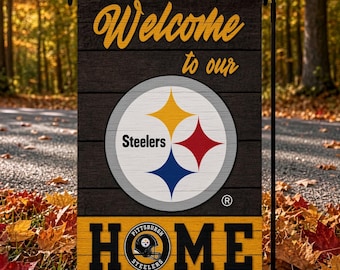 May include: A rectangular garden flag featuring a dark wood-grain background with the yellow text Welcome to our. A central circular Pittsburgh Steelers logo displays yellow, red, and blue stars. The bottom yellow stripe reads HOME with a team logo.