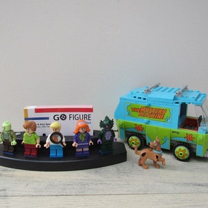 Business Card Holder Minifigure Stand, black poly lumber, holds 5 figures.