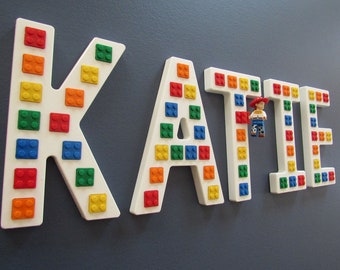 White "Brick Script" Wall Letters, embedded with real bricks.