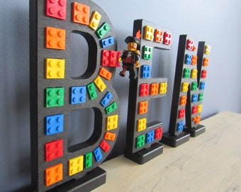 Black "Brick Script" Stand-up Letters, embedded with real bricks.