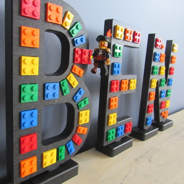 Black "Brick Script" Stand-up Letters, embedded with real bricks.