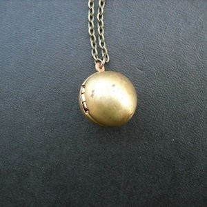 vintage sphere locket