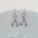 see more listings in the earring section