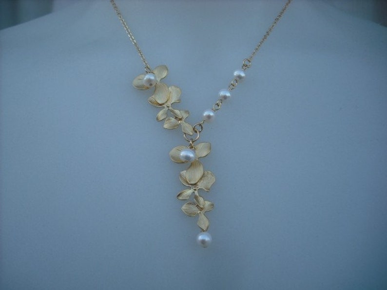 matte yellow gold two triple orchid flowers with freshwater pearl necklace 16K yellow gold plated chain image 1