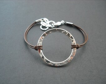 Erratically Hammered Hollow Center Round hoop bracelet - sterling silver plated