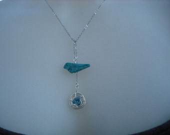 turquoise bird and a nest lariat - white gold plated chain