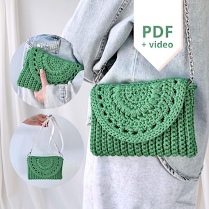 May include: A green crocheted clutch bag with a circular design and a white strap. The bag is being worn by a person. The image also includes the text "PDF + video".