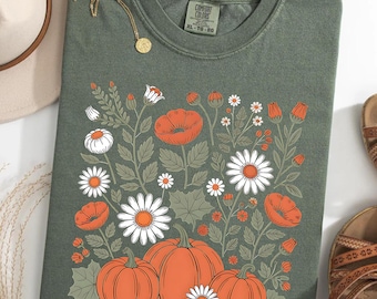 Koszula z jesiennymi kwiatami i dynią, Koszulka z jesiennym ogrodem w komfortowych kolorach, Koszulka z grafiką w stylu vintage z jesiennymi kwiatami, Rustykalna koszula z naszywką z dyni