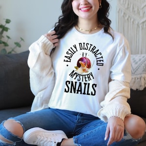 Magenta Mystery Snail Unisex T-Shirt | Quirky Humor Apparel for Snail Enthusiasts