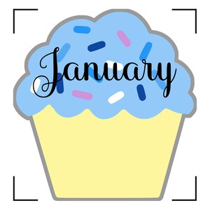 May include: A blue cupcake with white and blue sprinkles and the word "January" written in black cursive.