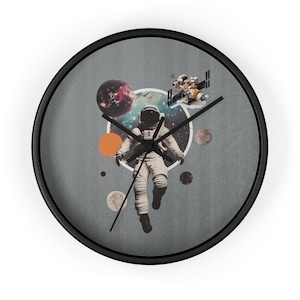 May include: A gray and white astronaut floating in space with planets and a space station in the background. The astronaut is wearing a white spacesuit with a black helmet. The planets are orange, red, and blue. The space station is white and has solar panels. The background is a dark blue with stars.