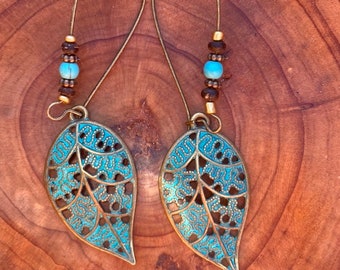 Intricate lace detail leaf earrings with patina, daisy spacers and seed beads