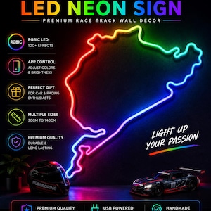 May include: A Nürburgring LED neon sign featuring a multi-colored race track outline. The sign displays text including Nürburgring LED Neon Sign, Premium Race Track Wall Decor, and Light Up Your Passion. A racing helmet and car model are visible below.