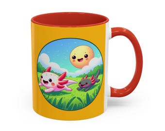 May include: A white ceramic mug with a red rim and handle. The mug features a yellow background with a cartoon illustration of two axolotls running in a grassy field with a smiling sun in the background.