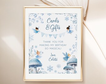 May include: A printable sign with a winter wonderland theme. It features blue fairies, snowflakes, and mushrooms. The text reads "Cards & Gifts" and "Thank you for making my birthday so magical! Love, Colette".