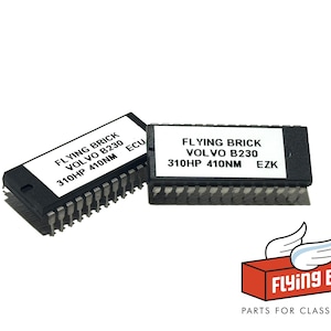 May include: Two black ECU chips with white labels displaying "FLYING BRICK VOLVO B230 310HP 410NM ECU" and "FLYING BRICK VOLVO B230 310HP 410NM EZK". The Flying Brick logo is in the bottom right corner. Parts for classic cars.