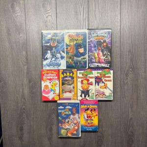 Classic Cartoon Anime VHS lot Batman Mr Freeze Scooby Doo Power Rangers Wild Force Barenstain Bears Babar Space Jam Rock a Doodle