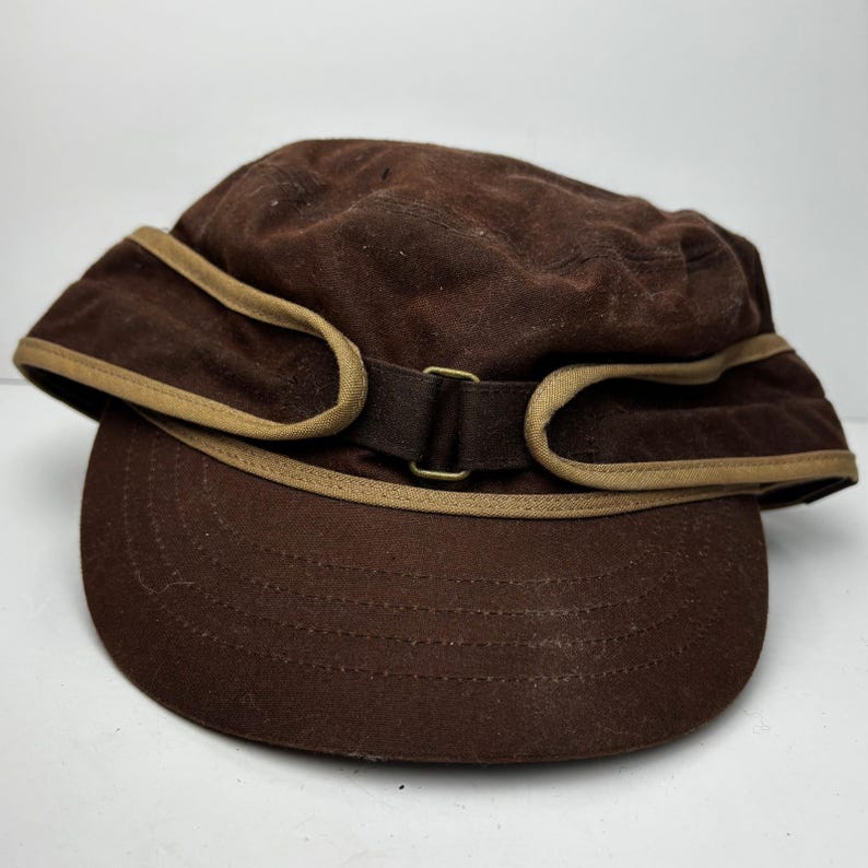 Cappello da cadetto Kangol Brennan in cotone cerato, marrone, con paraorecchie, taglia media CA23-3DJ-SE1 immagine 1