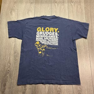 Vintage Focus Streetwear 1990s Graphic T Shirt Blue XL Extra Large Single Stitch Paintball
