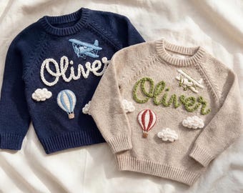 Personalized Hand-Embroidered Baby Sweater with Airplane and Hot Air Balloon Designs