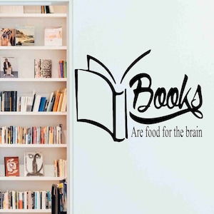 May include: Black and white wall decal with an open book design and the text "Books Are food for the brain".