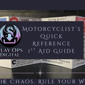May include: A motorcycle first aid guide with the text "Motorcyclist's Quick Reference 1st Aid Guide" and the Slay Ops Digital logo. The guide is white with red and blue accents and includes first aid instructions.