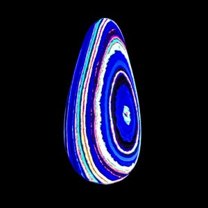 May include: A vibrant, abstract, teardrop-shaped object against a black background. The object features concentric bands of blue, white, and teal, creating a swirling pattern. The design has a modern, artistic aesthetic.