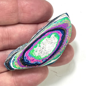 May include: A rustic wooden sign with the text "Welcome to our home" in white lettering. The sign features a distressed finish and a simple, inviting design, perfect for a front porch or entryway.