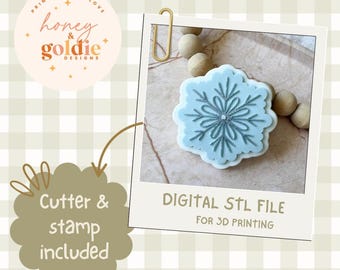 May include: A light blue snowflake cookie cutter and stamp set. The snowflake design is detailed with a central point and radiating lines. The image includes the text "DIGITAL STL FILE FOR 3D PRINTING" and "Cutter & stamp included."