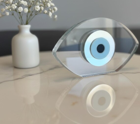 A hand-crafted modern evil eye (Mati) sculpture at $339 — this is genuine artisan work with cultural depth, striking enough to anchor a shelf or become a conversation-starting wedding favor.