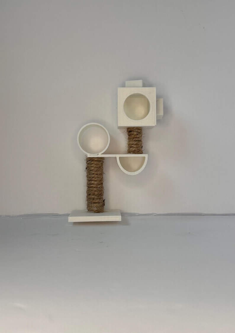 May include: White cat tree with a round platform, a square platform, and a sisal rope scratching post.