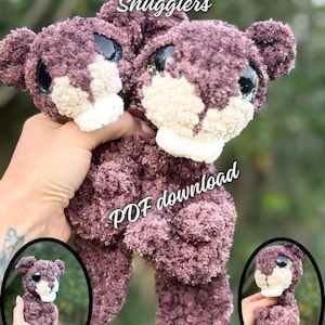 May include: Two plush, purple beaver stuffed animals with white muzzles and large, glittery eyes. The text "Nibble & Chomp Beaver Snugglers" and "PDF download" are visible. Two smaller images of the beaver are in the lower corners.