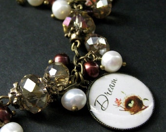 Bird Nest Charm Bracelet in Fresh Water Pearl, Taupe Crystals and Bronze. Handmade Bracelet.