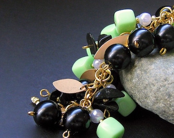 Spring Green Charm Bracelet Beaded in Vintage Beads, Black Glass and Gold - Triumphant. Handmade Jewelry