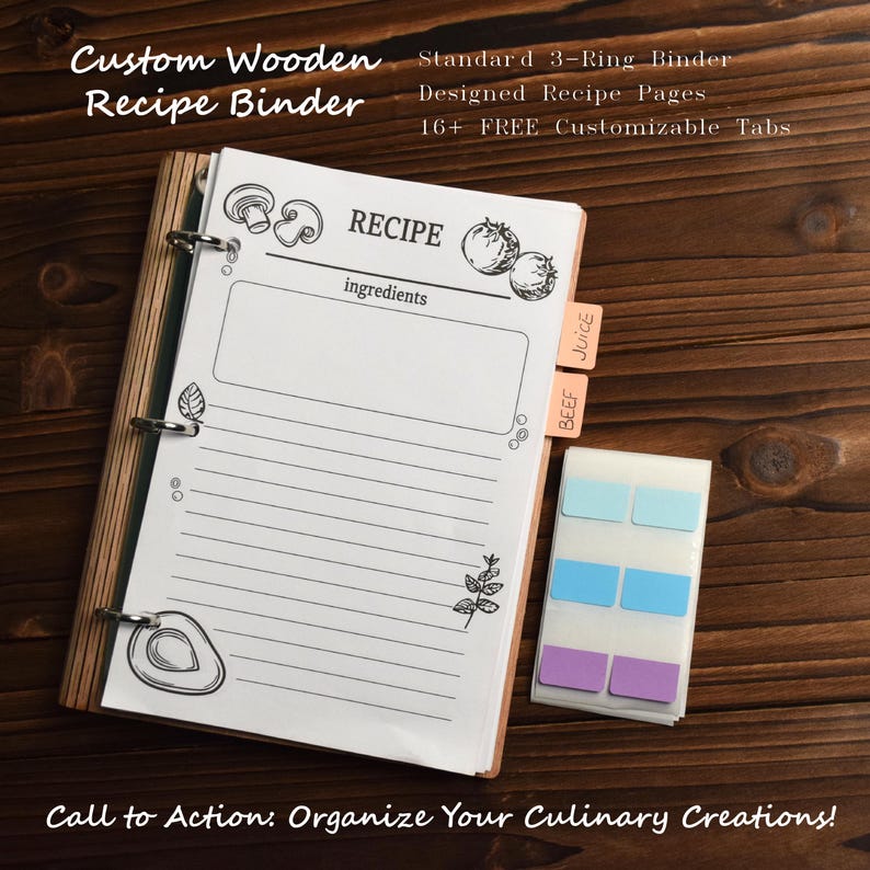 May include: A custom wooden recipe binder with a 3-ring design. The binder includes designed recipe pages and 16+ free customizable tabs. The recipe pages have illustrations of vegetables and the word "RECIPE" at the top. The binder is on a wooden surface.