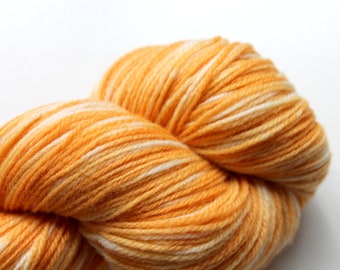 Naturally dyed yarn, orange yarn, fingering weight yarn, plant dyed yarn, hand painted yarn, shawl yarn, fall color yarn