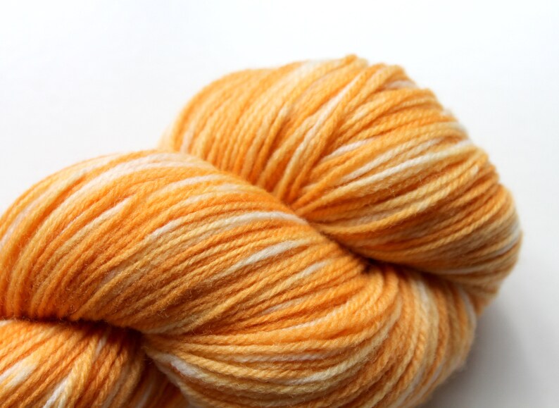 Naturally dyed yarn, orange yarn, fingering weight yarn, plant dyed yarn, hand painted yarn, shawl yarn, fall color yarn image 1