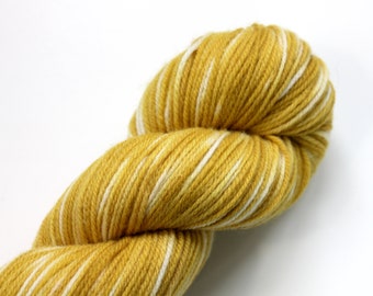 Naturally dyed yarn, mustard yellow yarn, fingering weight yarn, plant dyed yarn, hand painted yarn, shawl yarn, fall color yarn