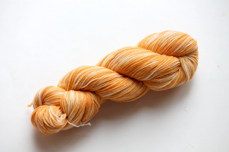 Naturally dyed yarn, orange yarn, fingering weight yarn, plant dyed yarn, hand painted yarn, shawl yarn, fall color yarn image 4
